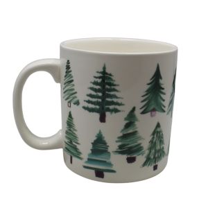 A white mug with pine trees in shades of green with different line work.