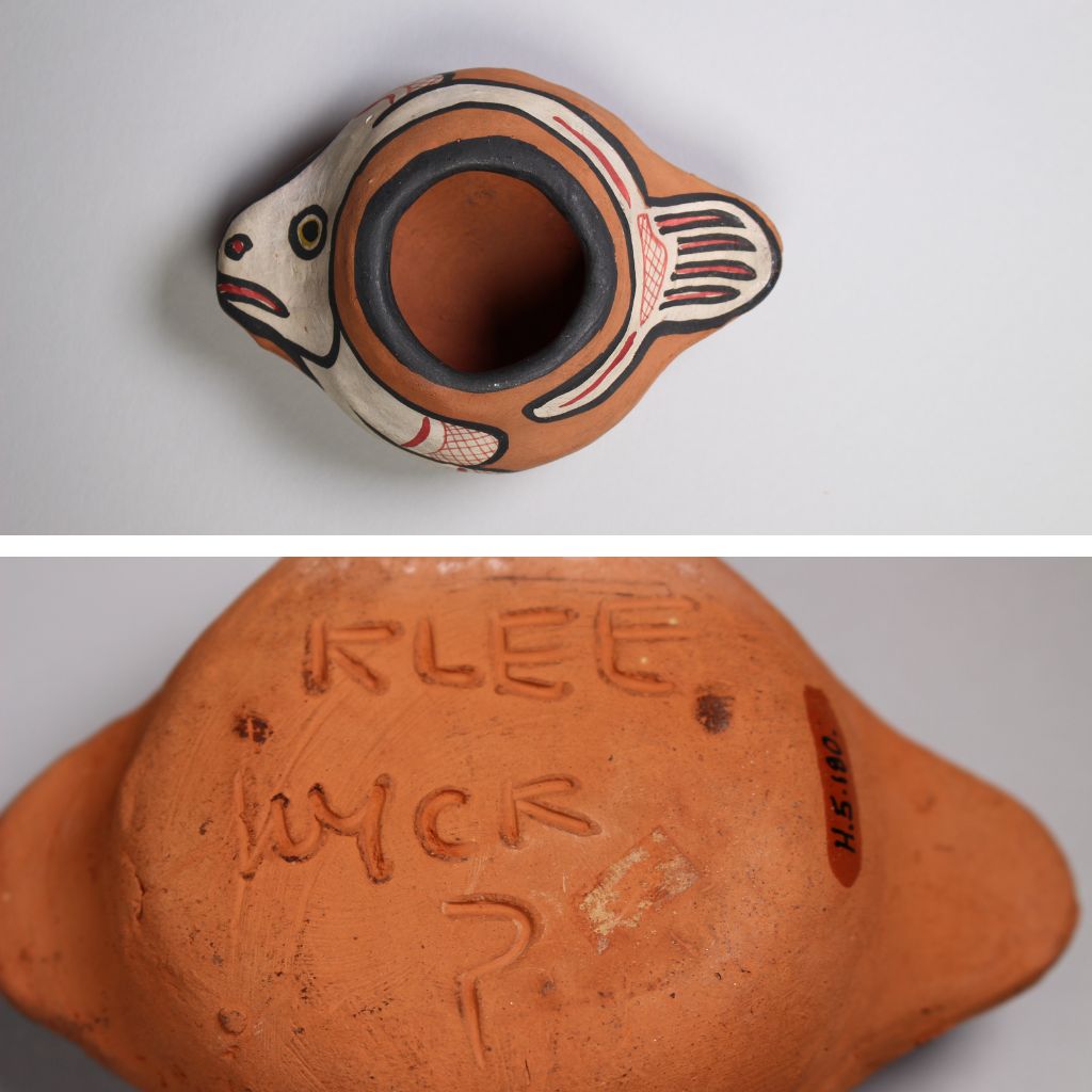 A double image. On the top there is an image of a small round pot with nubs on either side that have been painted. The one side is painted with a white fish face, the other the tail. Below is an image of the reverse with the name Klee Kyck