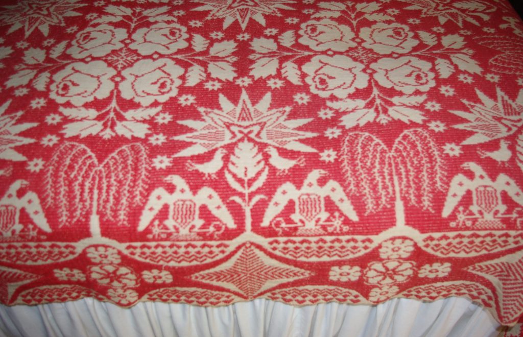 Red woven coverlet, detail